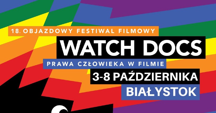 Na fioletowo - niebiesko -zielono - czerwono - żółto- pomarańczowym tle jest napisane 18. Objazdowy Festiwal Filmowy Watch Docs Prawa Człowieka w Filmie